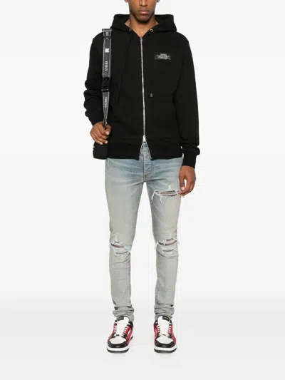 Amiri Leather-trimmed Jeans In Blue