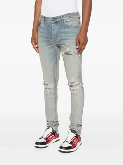 Amiri Leather-trimmed Jeans In Blue
