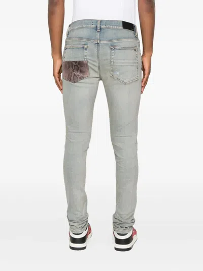 Amiri Leather-trimmed Jeans In Blue