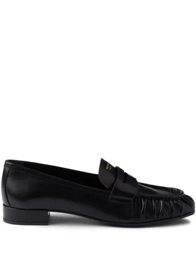 Prada Rounded Toe Loafers With Textured Detailing And Low Block Heel In Black