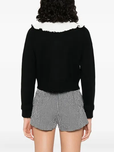 Sandro Two-tone Cardigan In Black