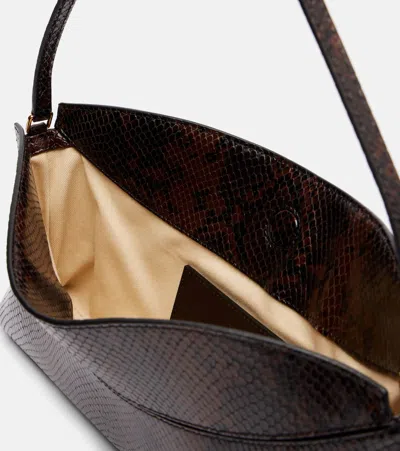 Jacquemus Ovalo Clutch In Brown