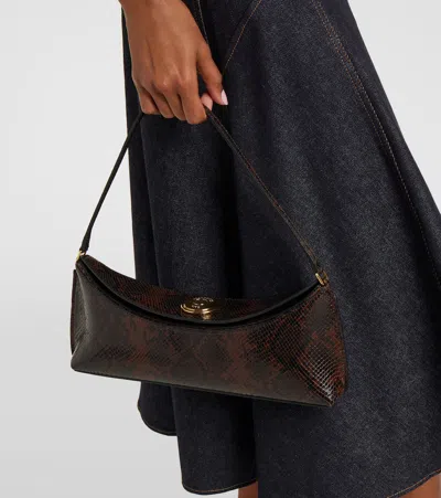 Jacquemus Ovalo Clutch In Brown