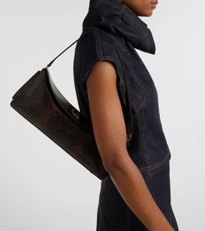 Jacquemus Ovalo Clutch In Brown