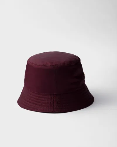Prada Logo-plaque Nylon Bucket Hat In Burgundy