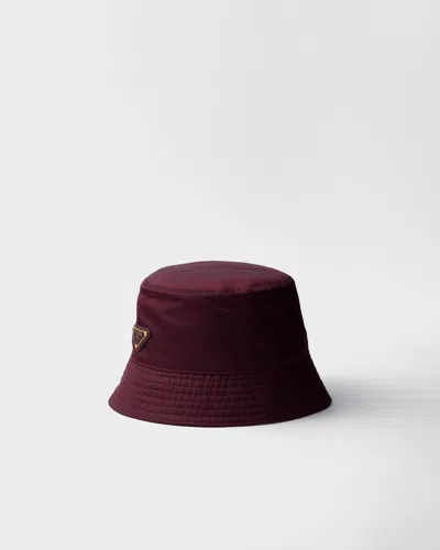 Prada Logo-plaque Nylon Bucket Hat In Burgundy