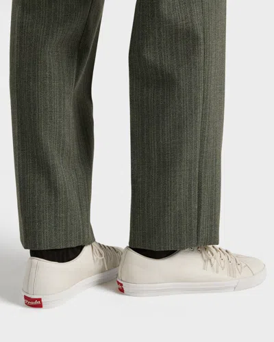 Prada Low Profile Round Toe Rubber Sole Sneakers In White
