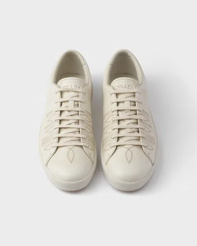 Prada Low Profile Round Toe Rubber Sole Sneakers In White