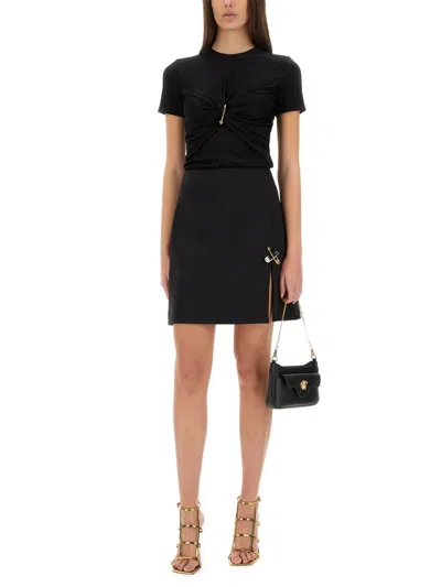 Versace Safety Pin Gathered Short-sleeved Top In Black