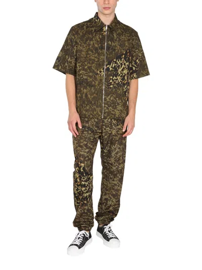 Givenchy Animal Logo Print Jogger Pants Brown In Brown