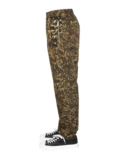 Givenchy Animal Logo Print Jogger Pants Brown In Brown