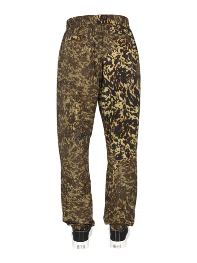 Givenchy Animal Logo Print Jogger Pants Brown In Brown