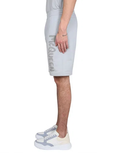 Alexander Mcqueen Men Bermuda Shorts With Graffiti Logo Print In Gray