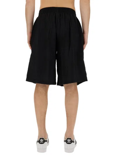 Family First Appliqué-logo Shorts In Black