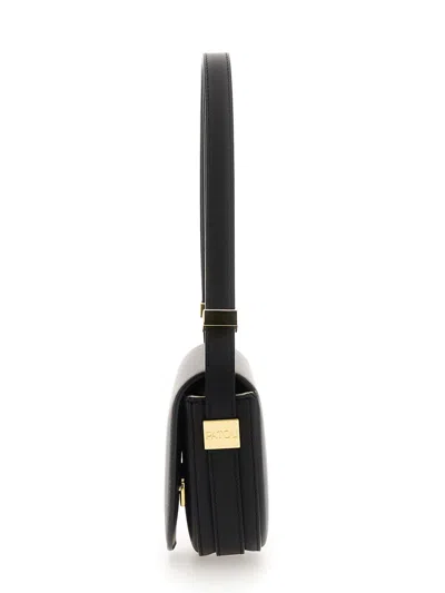 Patou Semi-round Shoulder Bag In Black