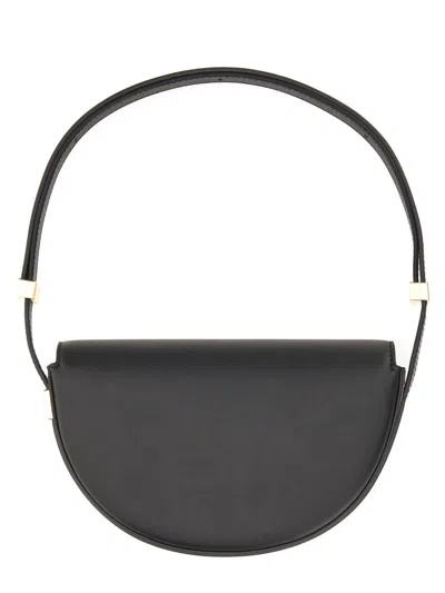 Patou Semi-round Shoulder Bag In Black