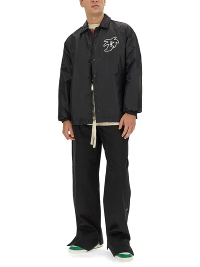 Palm Angels Contrasting-waistband Tapered Trousers In Black
