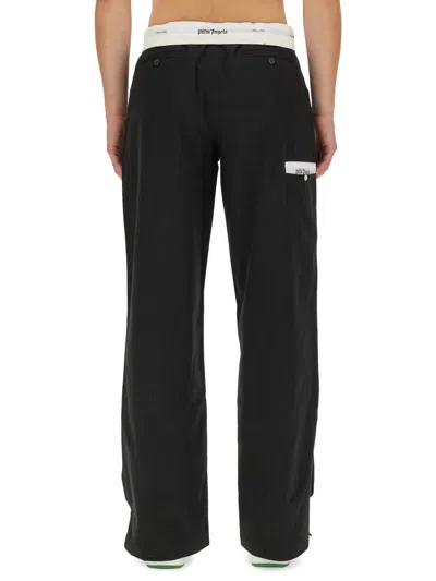 Palm Angels Contrasting-waistband Tapered Trousers In Black