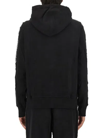 Versace Jeans Couture Full-zip Hoodie With Adjustable Drawstrings And Subtle Branding In Black