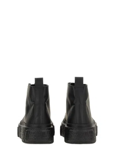 Mm6 Maison Margiela Mm6 Oversized Sole High-top Leather Sneakers In Black