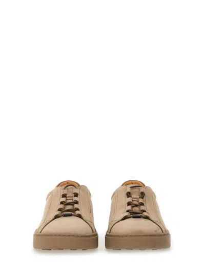 Tod's Round Toe Low-top Rubber Sole Sneakers In Brown