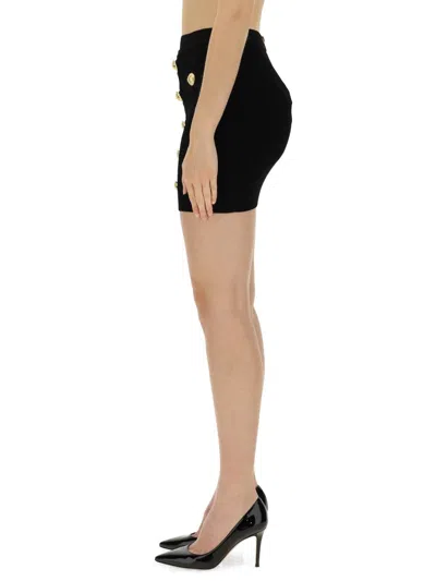 Balmain Knitted Mini Skirt With Embossed Buttons In Black