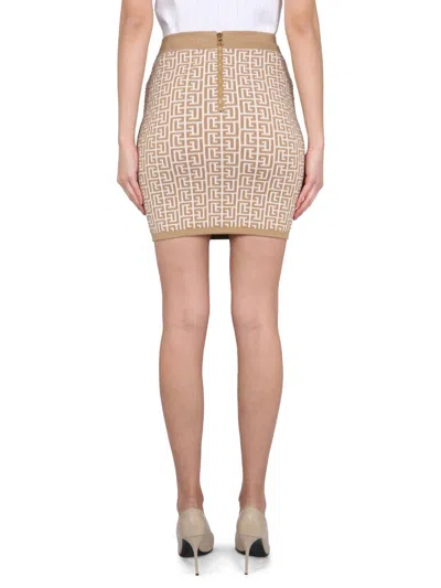 Balmain Fitted Mini Skirt With All-over Pattern In Gold