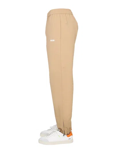Msgm Logo-print Elasticated Waist Trousers In Neutral