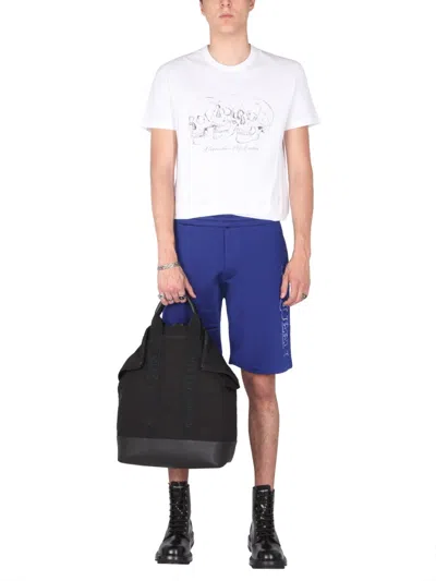 Alexander Mcqueen Men's Shorts With Embroidered Logo In Blue