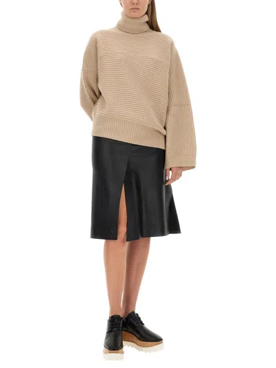 Stella Mccartney Textured Knit Oversized Turtleneck Shirt In Neutral