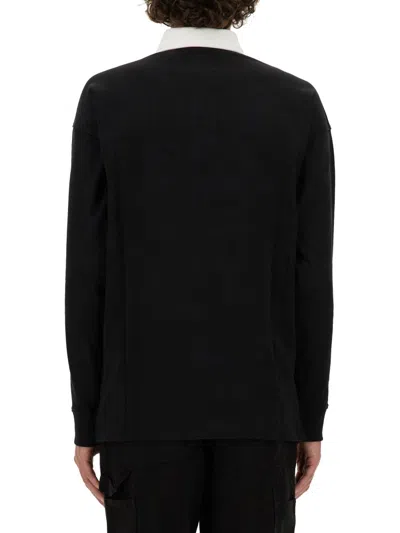 Moschino Upsidedown Logo Polo Shirt In Black