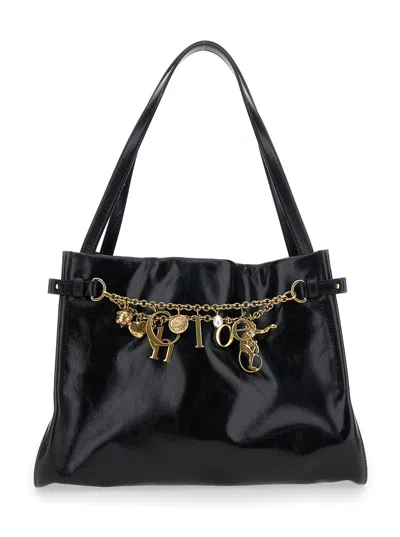 Chloé Logo Charms Patent Leather Hobo Bag In Black