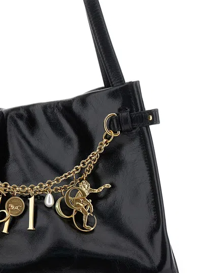 Chloé Logo Charms Patent Leather Hobo Bag In Black