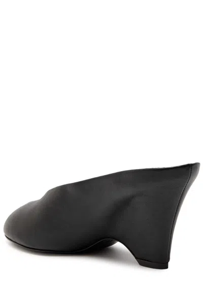 Khaite Apollo 75 Leather Wedge Mules In Black