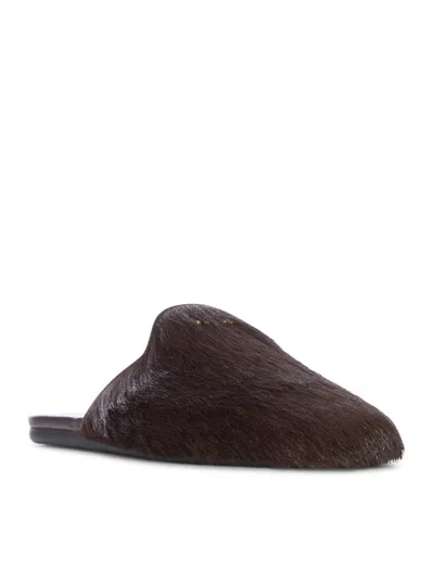Prada Fur Leather Mules In Brown