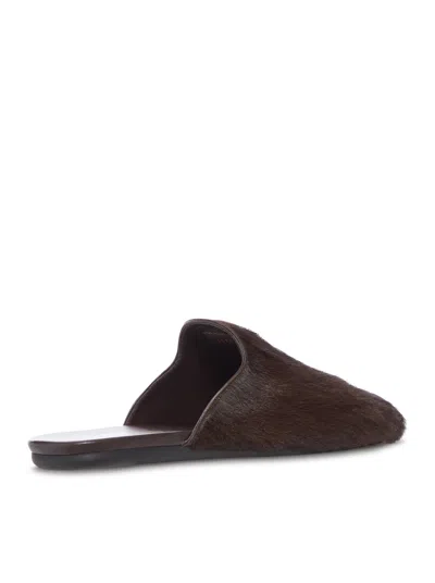 Prada Fur Leather Mules In Brown
