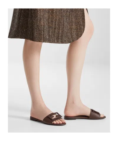 Fendi Flat Sole Open Toe Textured Strap Slides In Brown