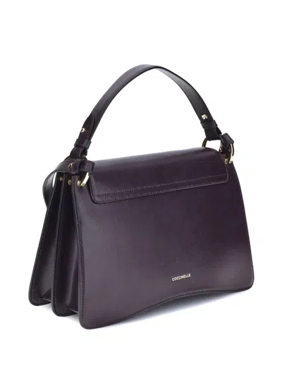 Coccinelle Pebbled Leather Shoulder Bag In Purple