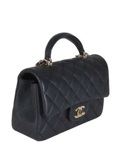 Pre-owned Chanel 2021-2023 Mini Quilted Lambskin Top Handle Bag In Blue