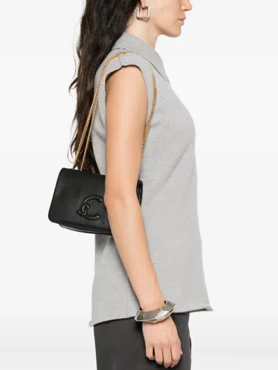 Coccinelle Mini Embossed-logo Chain Shoulder Bag In Black