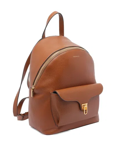 Coccinelle Flap-pocket Zip Backpack In Brown