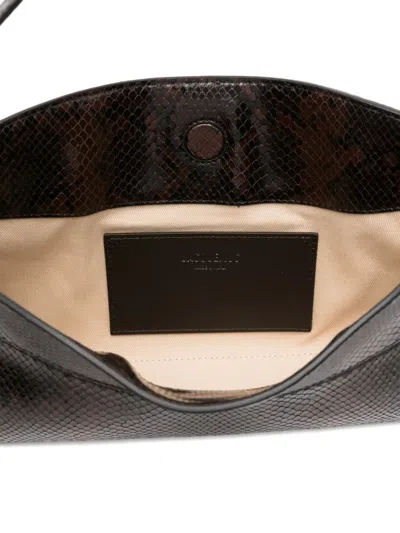 Jacquemus Ovalo Clutch In Brown