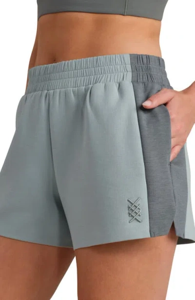 Rhone Dreamglow Color Blocked Shorts In Blue