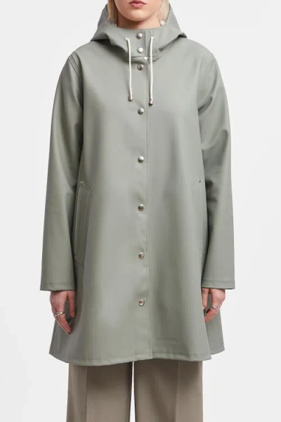 Stutterheim Mosebacke Hooded Long Sleeve Raincoat In Green