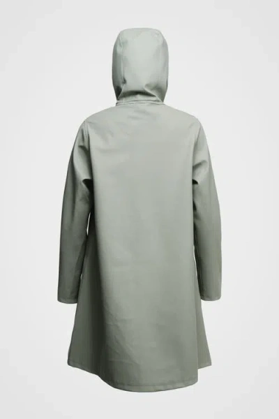 Stutterheim Mosebacke Hooded Long Sleeve Raincoat In Green