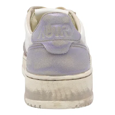 Autry Low-top Leather Sneakers With Vintage Effect In White