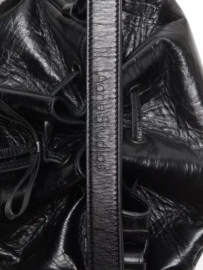 Acne Studios Multipocket Mini Crinkled Leather Bucket Bag In Black