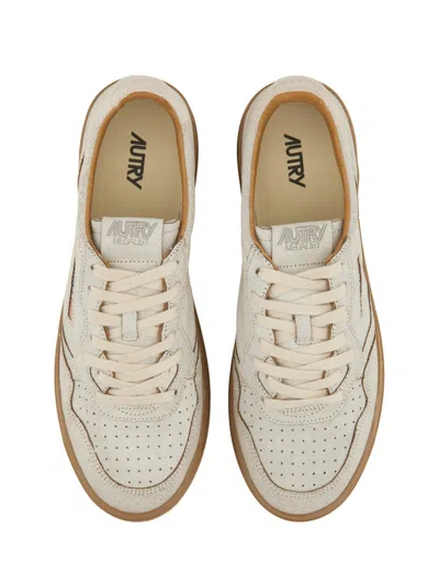 Autry Low Top Leather Sneakers With Perforated Round Toe