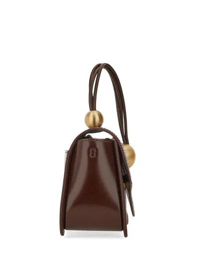 Cult Gaia Flap Shoulder Bag With Curved Top Handle In Brown