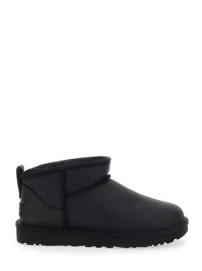 Ugg Classic Ultra Mini Black Ankle Boots With Shearling Lining In Leather Woman In Black